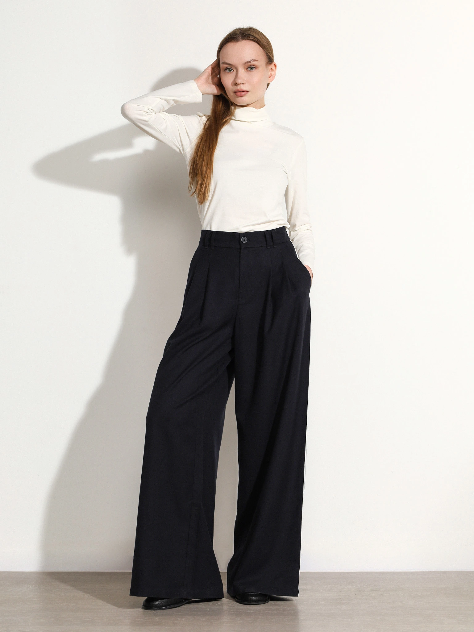 Брюки-палаццо темно-синего цвета с лампасами